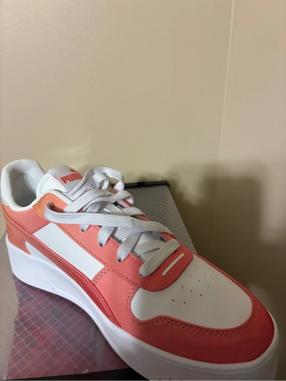 Puma women’s White and Orange Casual Sneakers